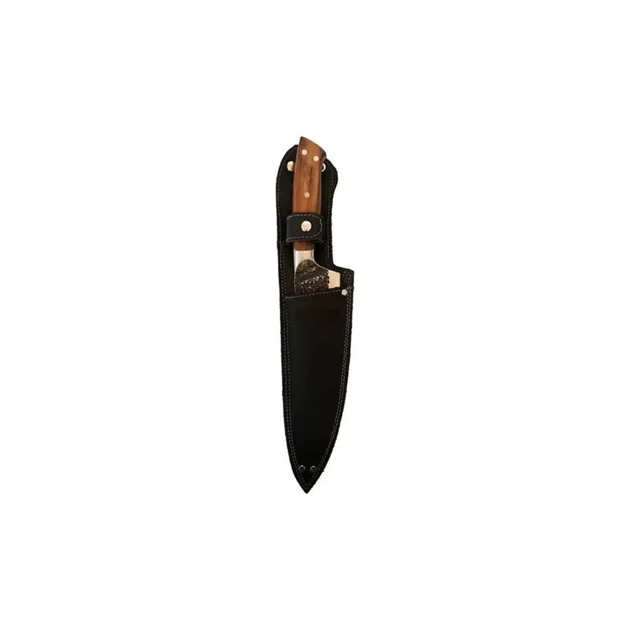 Cuchillo parrillero Curacaví Kangkawe guardado en su funda de cuero negra