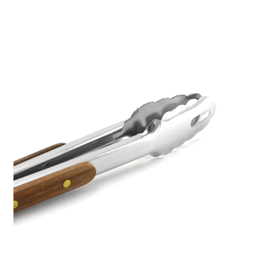 Detalle de las pinzas dentadas de la tenaza parrillera Kangkawe para agarrar la carne