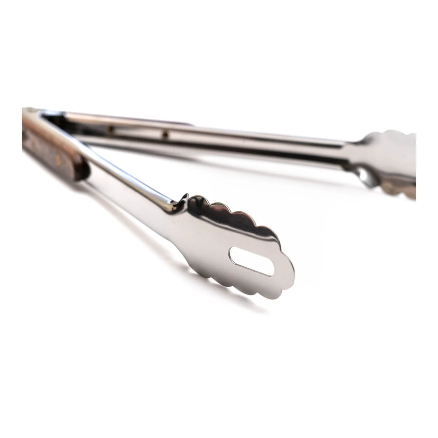 Detalle de las pinzas dentadas de la tenaza parrillera XL Kangkawe