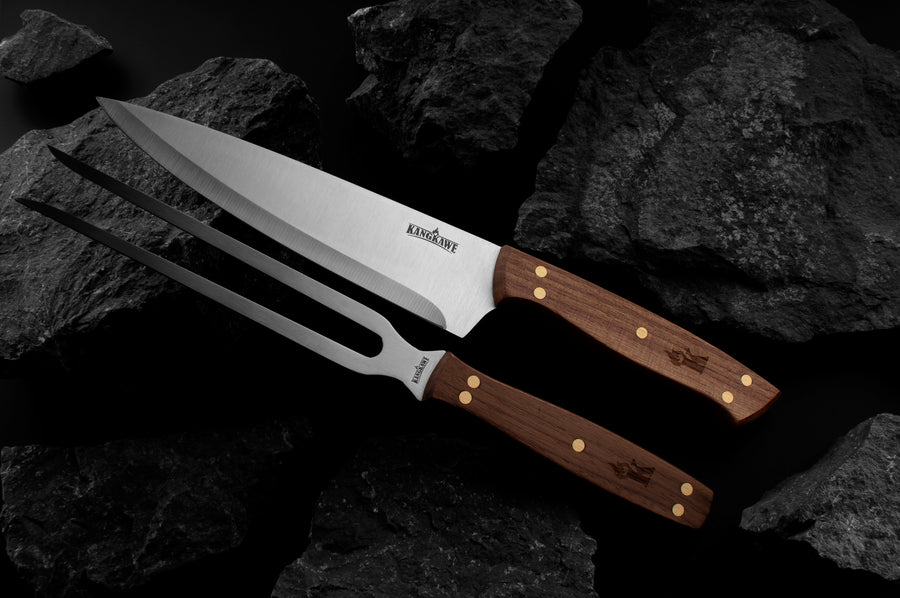 Set parrillero cuchillo y tenedor Kangkawe sobre carbón de parrilla